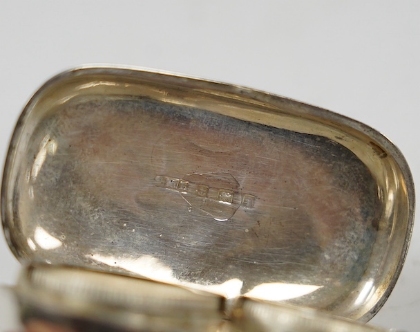 A George V engraved silver sovereign/half sovereign case, Birmingham 1910, 50mm. Condition - fair
